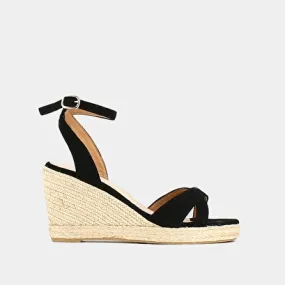 Espadrilles with high heels and straps in black leather