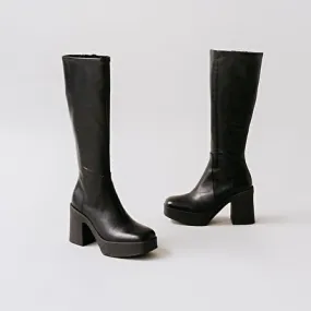 Platform boots in black aged leather